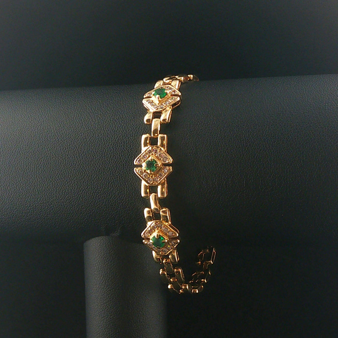 14k Yellow Gold Emerald and Diamond 16g Ladies Panther Link Bracelet 7.25"