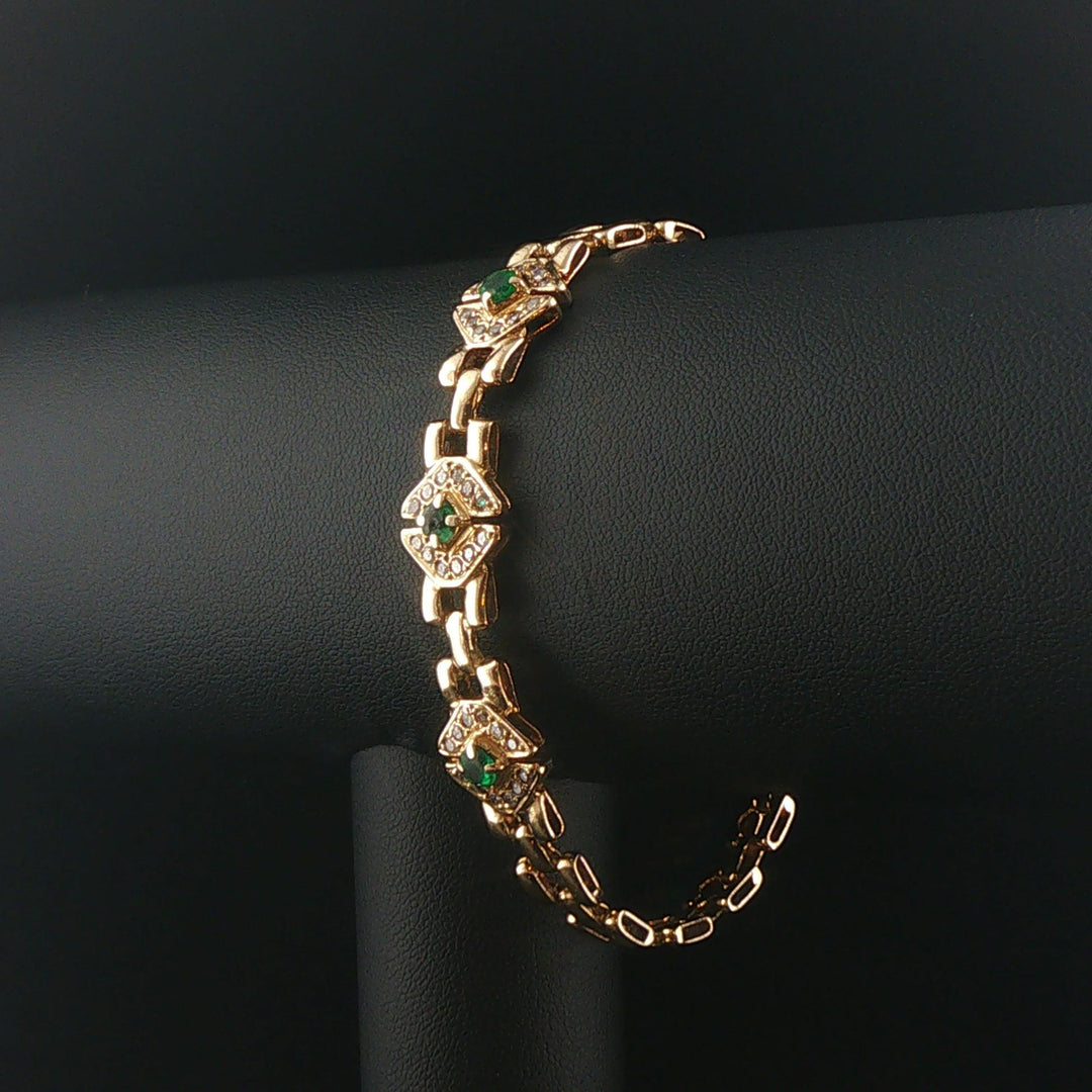 14k Yellow Gold Emerald and Diamond 16g Ladies Panther Link Bracelet 7.25"