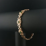 14k Yellow Gold Emerald and Diamond 16g Ladies Panther Link Bracelet 7.25"
