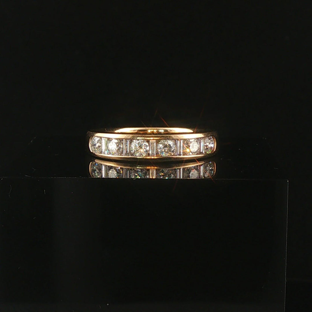 14k Yellow Gold and 0.70cttw Round and Baguette Cut Diamond Band Ring Size 6.5
