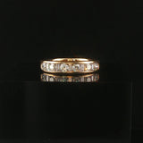 14k Yellow Gold and 0.70cttw Round and Baguette Cut Diamond Band Ring Size 6.5