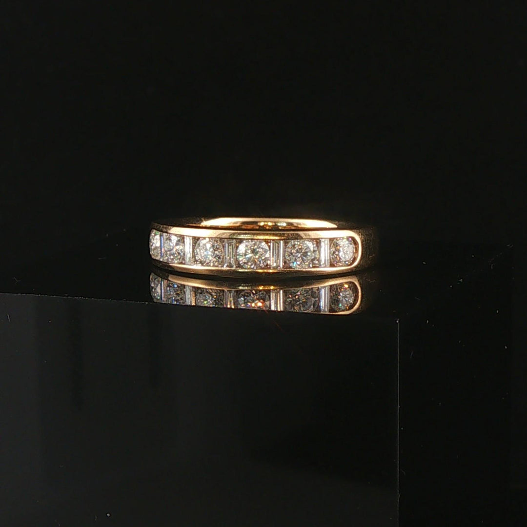 14k Yellow Gold and 0.70cttw Round and Baguette Cut Diamond Band Ring Size 6.5