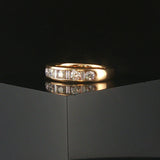 14k Yellow Gold and 0.70cttw Round and Baguette Cut Diamond Band Ring Size 6.5