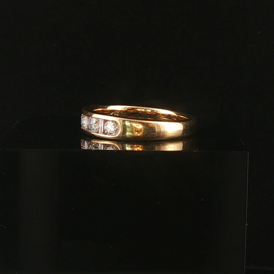 14k Yellow Gold and 0.70cttw Round and Baguette Cut Diamond Band Ring Size 6.5