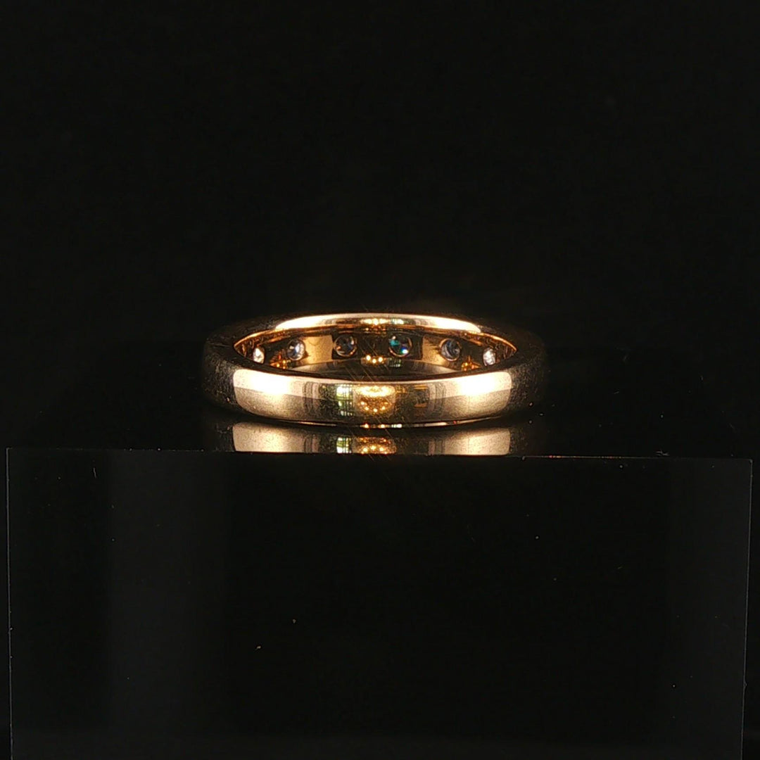 14k Yellow Gold and 0.70cttw Round and Baguette Cut Diamond Band Ring Size 6.5