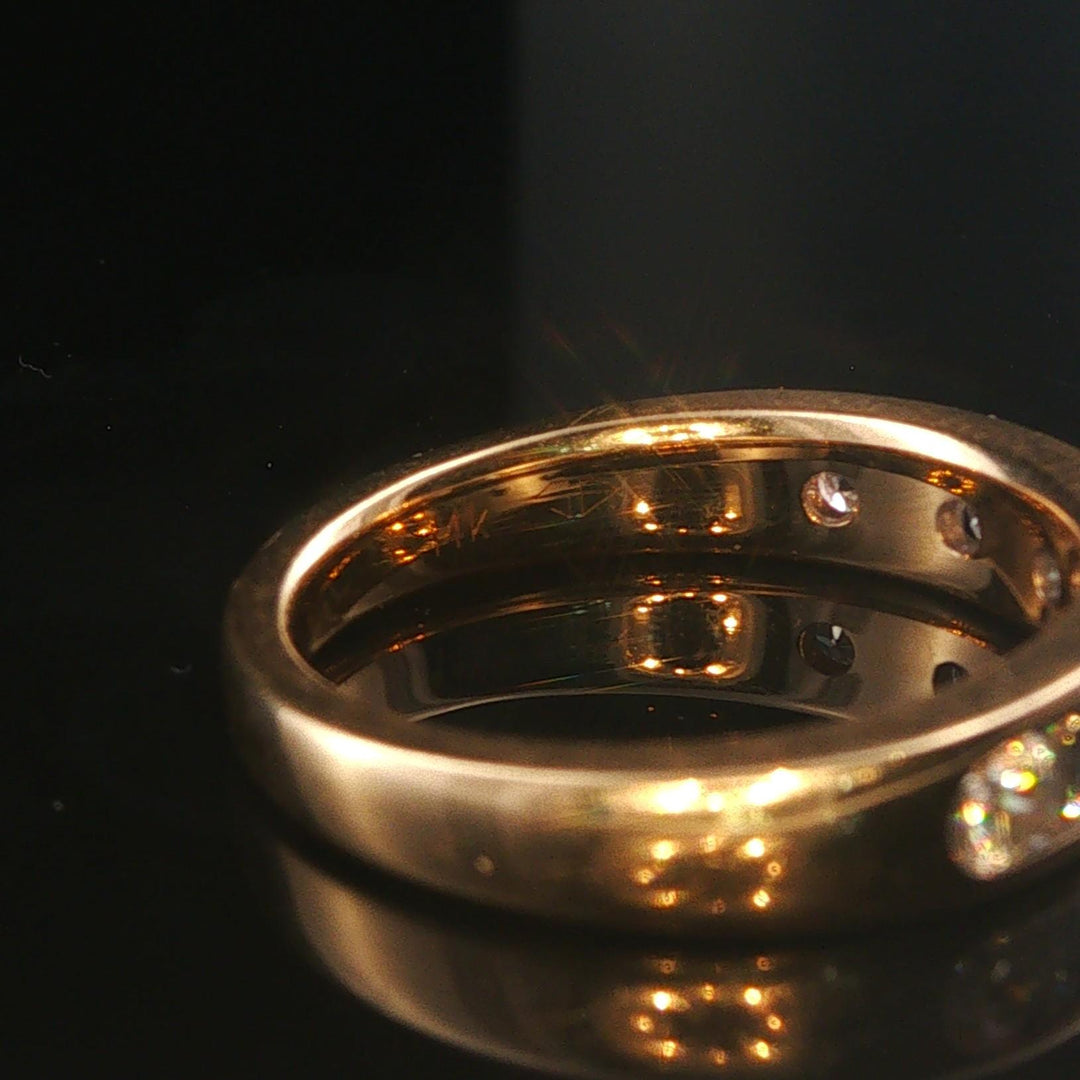 14k Yellow Gold and 0.70cttw Round and Baguette Cut Diamond Band Ring Size 6.5