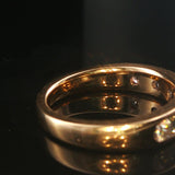 14k Yellow Gold and 0.70cttw Round and Baguette Cut Diamond Band Ring Size 6.5