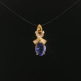 18k Yellow Gold 1.22ct Tanzanite and Diamond Bow Pendant 0.75"