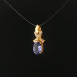 18k Yellow Gold 1.22ct Tanzanite and Diamond Bow Pendant 0.75"