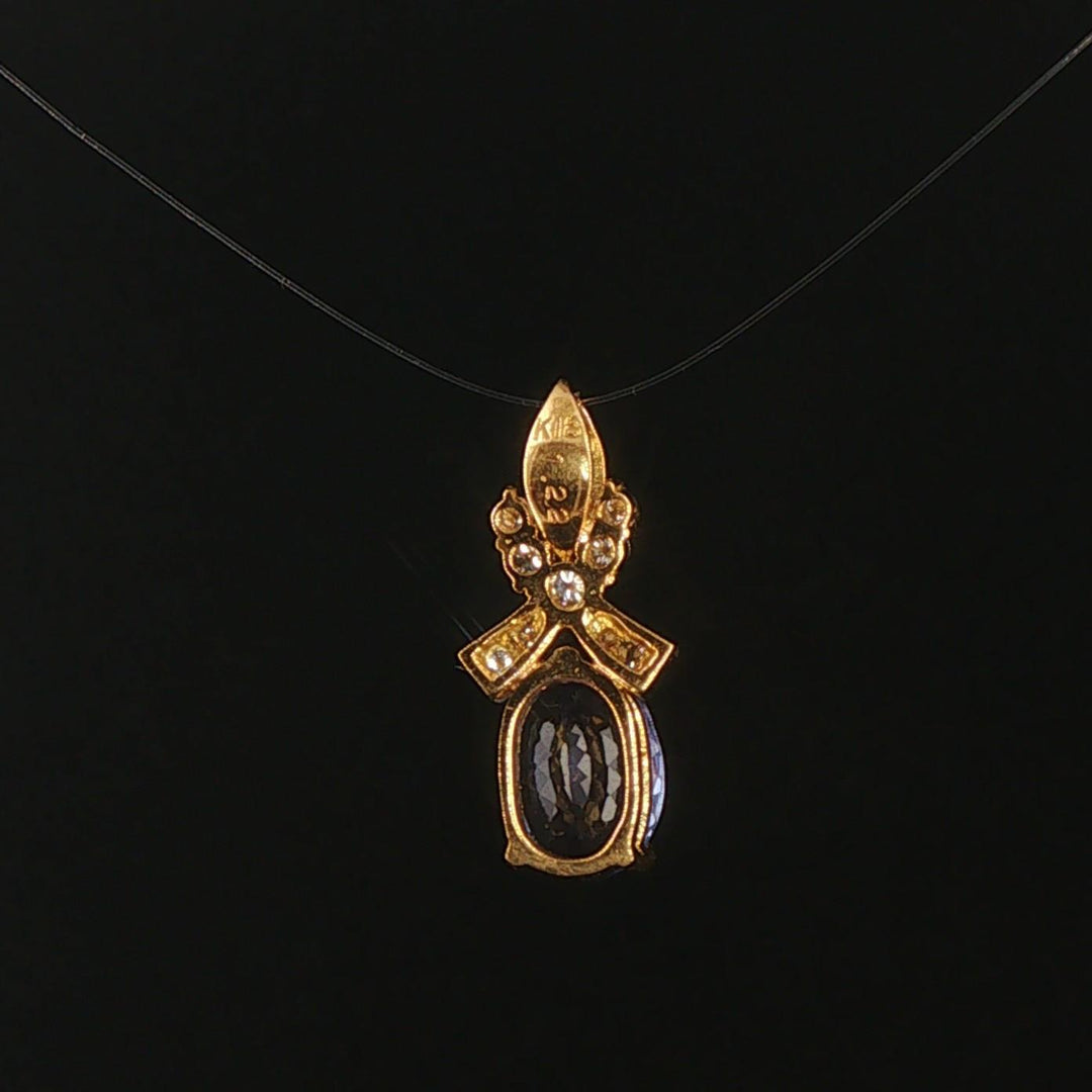18k Yellow Gold 1.22ct Tanzanite and Diamond Bow Pendant 0.75"