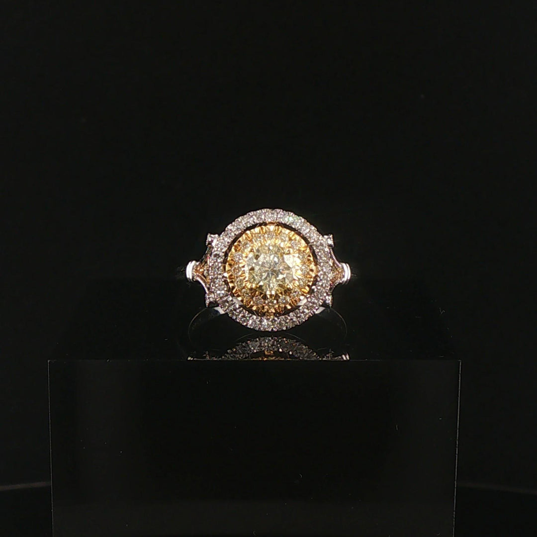 18k White Gold and 0.85cttw Yellow and White Diamond Halo Ring Size 7.25