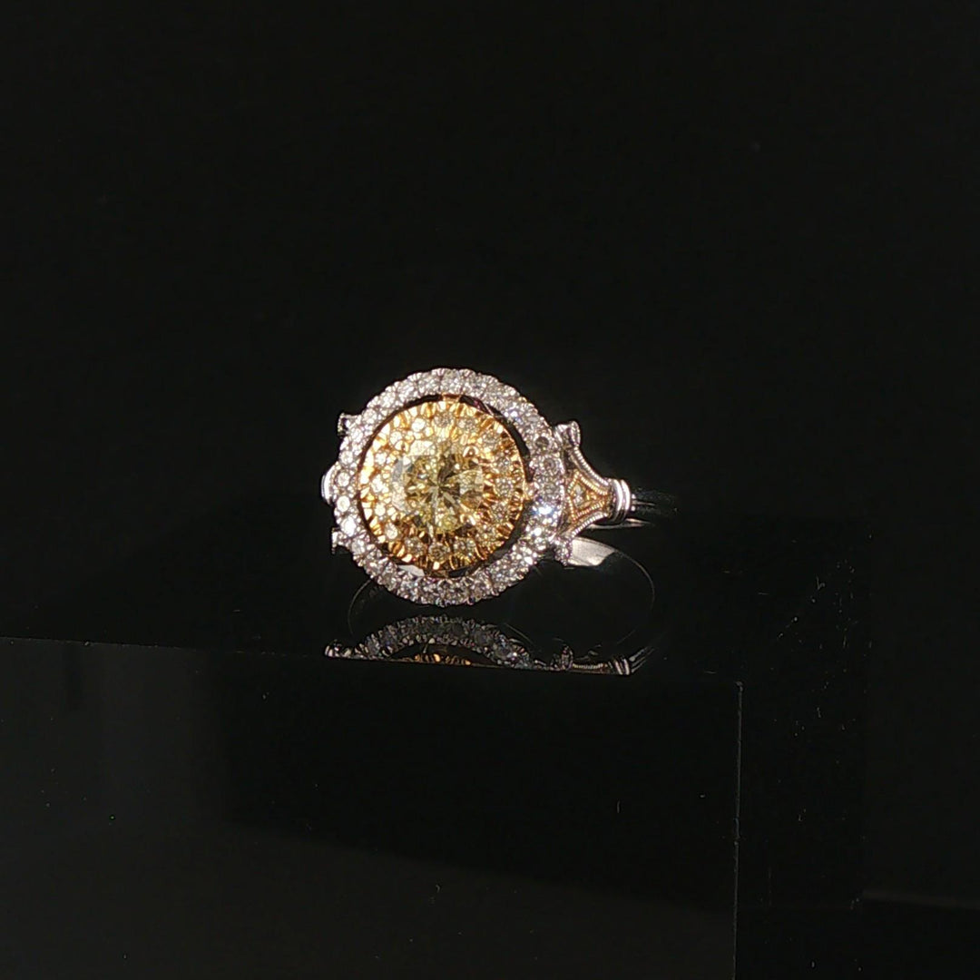 18k White Gold and 0.85cttw Yellow and White Diamond Halo Ring Size 7.25