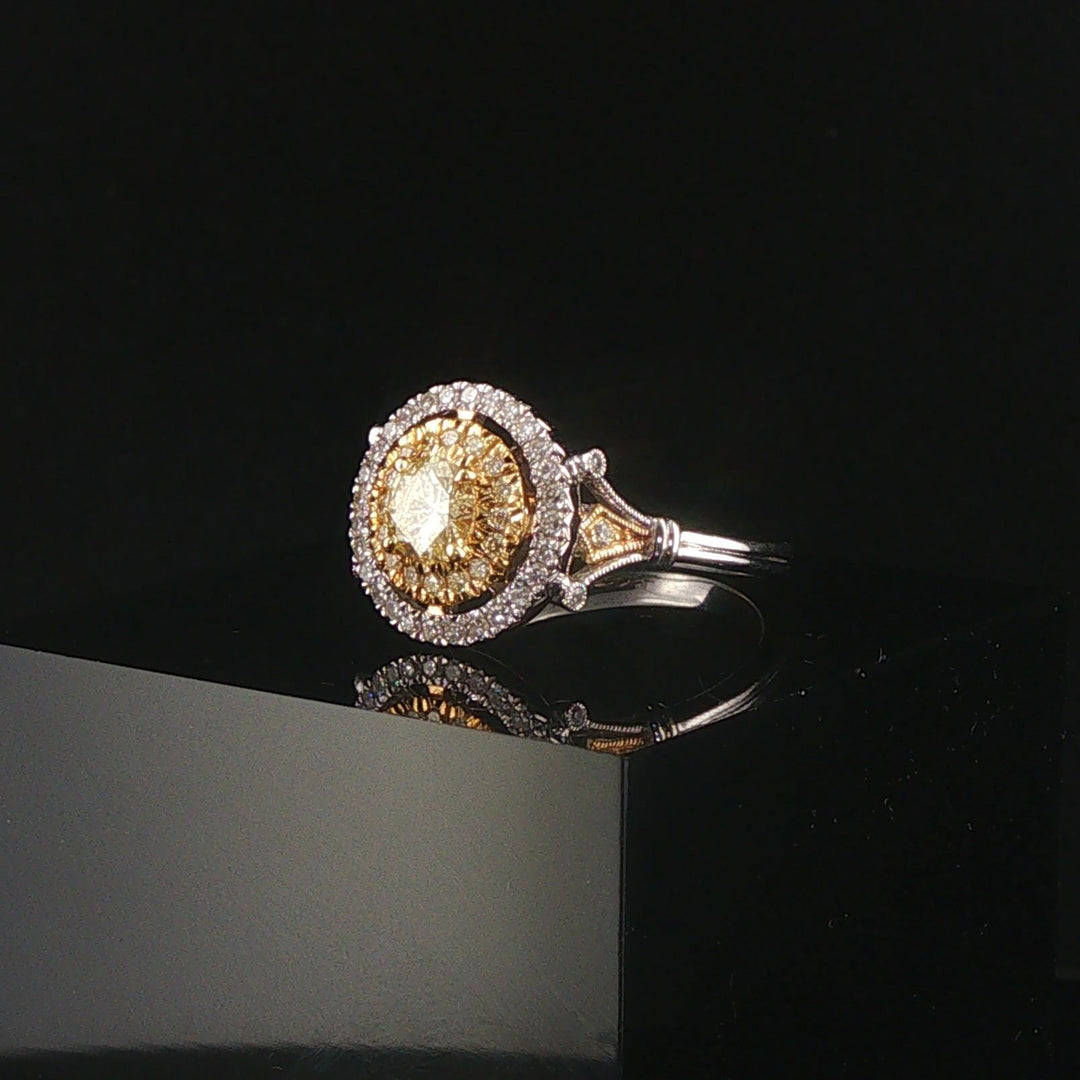 18k White Gold and 0.85cttw Yellow and White Diamond Halo Ring Size 7.25