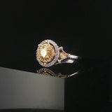 18k White Gold and 0.85cttw Yellow and White Diamond Halo Ring Size 7.25