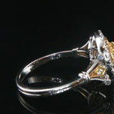 18k White Gold and 0.85cttw Yellow and White Diamond Halo Ring Size 7.25