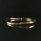 14k Yellow Gold and 0.50cttw Diamond 10.6g Curved Bangle Bracelet 6.5"
