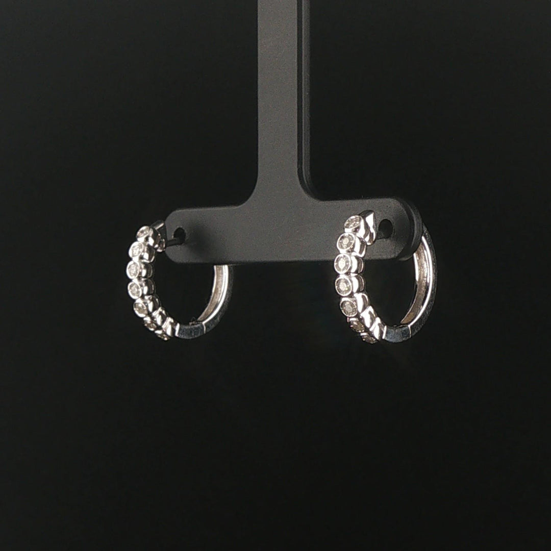 14k White Gold and 0.30cttw Bezel Set Diamonds Huggie Earrings