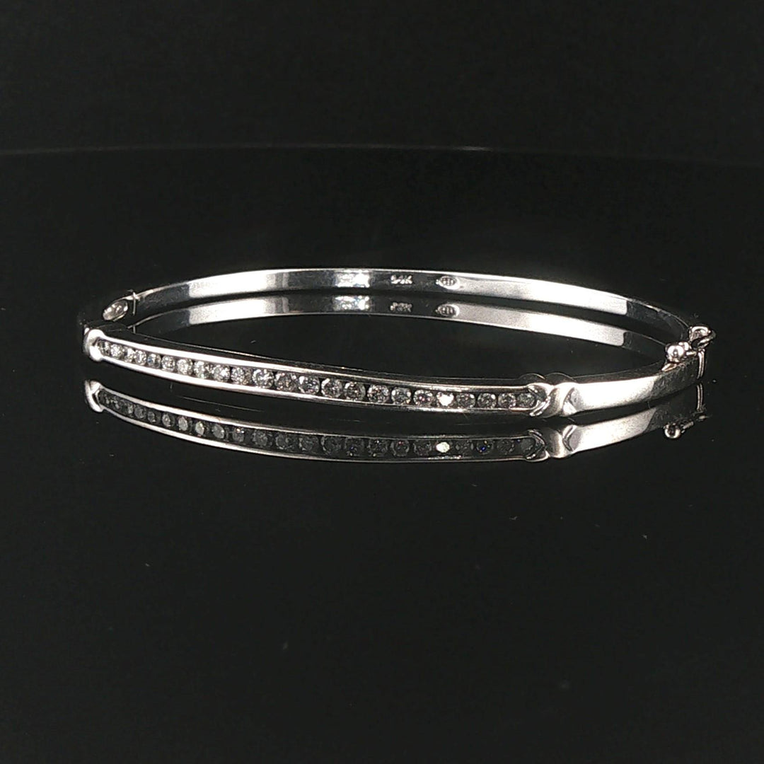 14k White Gold and 0.50cttw Channel Set Diamond Bangle Bracelet 6.75"