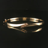 14k Yellow Gold and 0.20cttw Diamond 15.2g Bypass Bangle Bracelet 7"