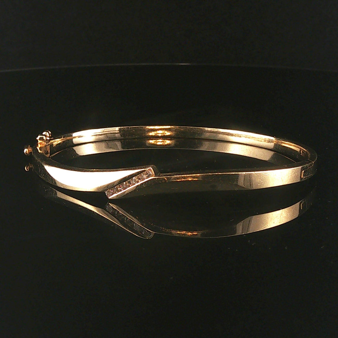 14k Yellow Gold and 0.20cttw Diamond 15.2g Bypass Bangle Bracelet 7"