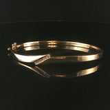 14k Yellow Gold and 0.20cttw Diamond 15.2g Bypass Bangle Bracelet 7"