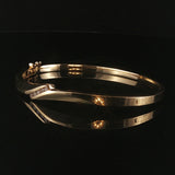 14k Yellow Gold and 0.20cttw Diamond 15.2g Bypass Bangle Bracelet 7"