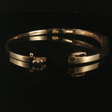 14k Yellow Gold and 0.20cttw Diamond 15.2g Bypass Bangle Bracelet 7"