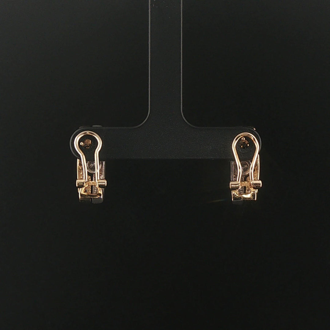 14k Yellow and White Gold 0.18cttw Flush Set Diamond Huggie Earrings