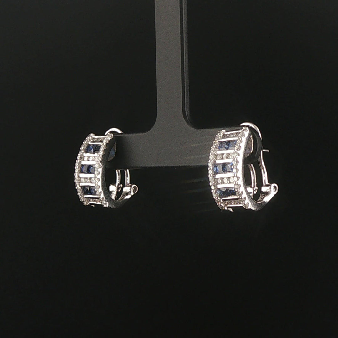 14k White Gold 0.70cttw Diamond and Blue Sapphire Huggie Earrings