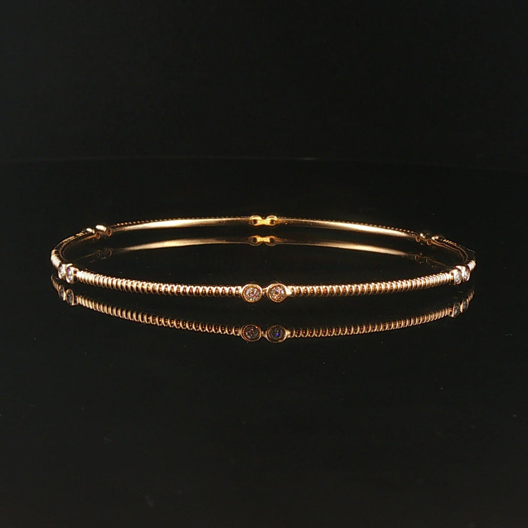 14k Yellow Gold and 0.25cttw Bezel Set Diamond Ribbed Bangle Bracelet 7.75"