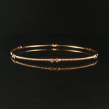 14k Yellow Gold and 0.25cttw Bezel Set Diamond Ribbed Bangle Bracelet 7.75"