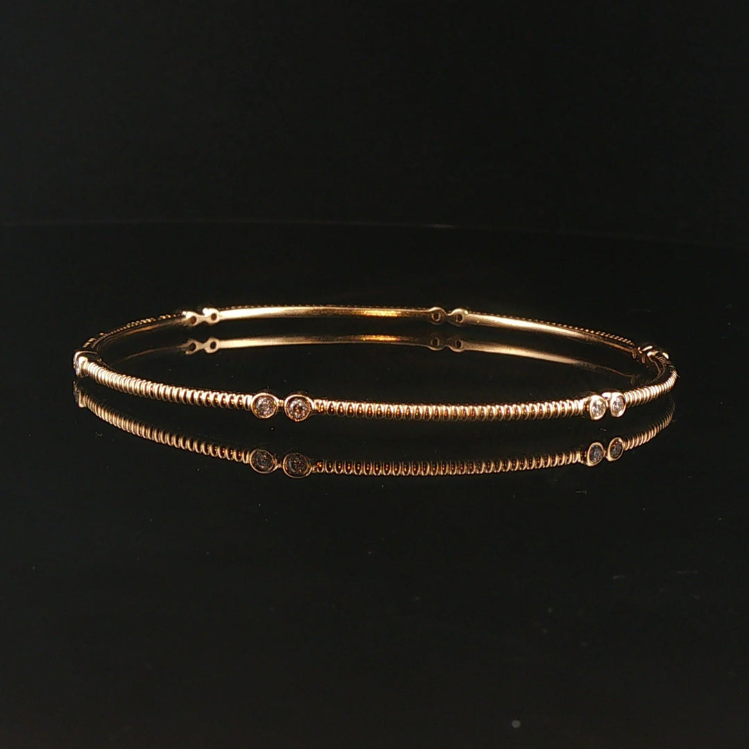 14k Yellow Gold and 0.25cttw Bezel Set Diamond Ribbed Bangle Bracelet 7.75"