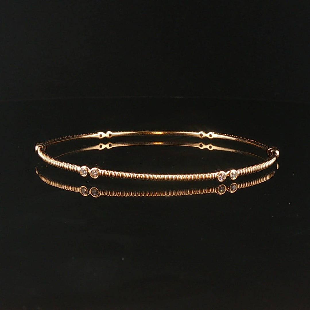 14k Yellow Gold and 0.25cttw Bezel Set Diamond Ribbed Bangle Bracelet 7.75"