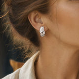 14k White Gold and 0.40cttw Round and Baguette Diamond Huggie Earrings