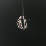 14k White Gold and 0.40cttw Round and Baguette Diamond Huggie Earrings
