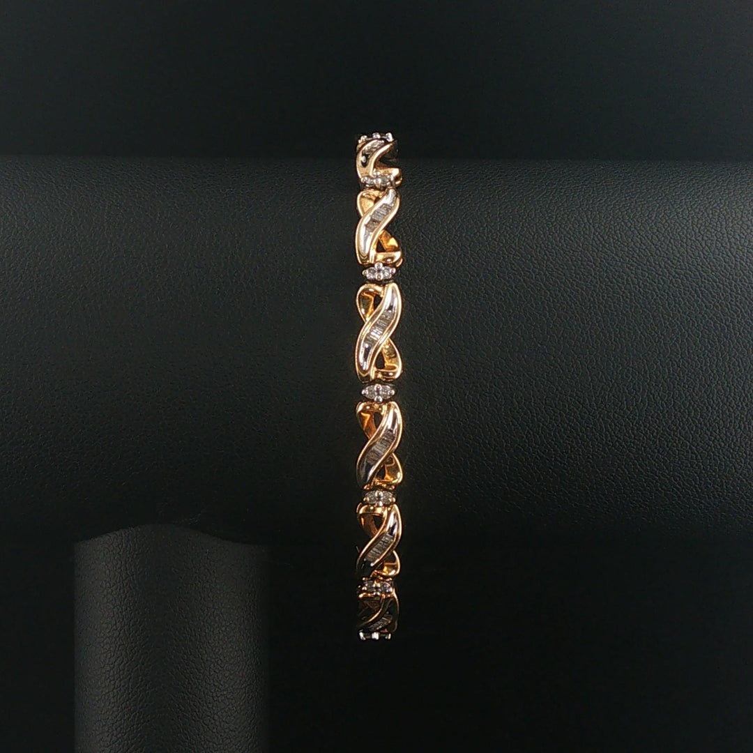 14k Yellow Gold and 1.50cttw Round and Baguette Diamond Vintage Link Bracelet 7"