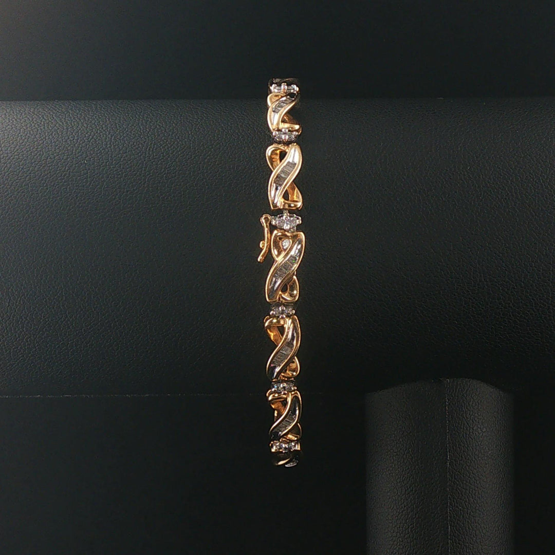 14k Yellow Gold and 1.50cttw Round and Baguette Diamond Vintage Link Bracelet 7"