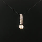 18k White Gold Pearl and 0.30cttw Diamond Pendant 1"
