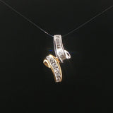 14k Yellow and White Gold 0.50cttw Round and Baguette Diamond Slide Pendant 1"