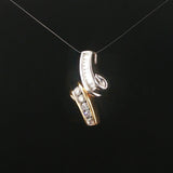 14k Yellow and White Gold 0.50cttw Round and Baguette Diamond Slide Pendant 1"