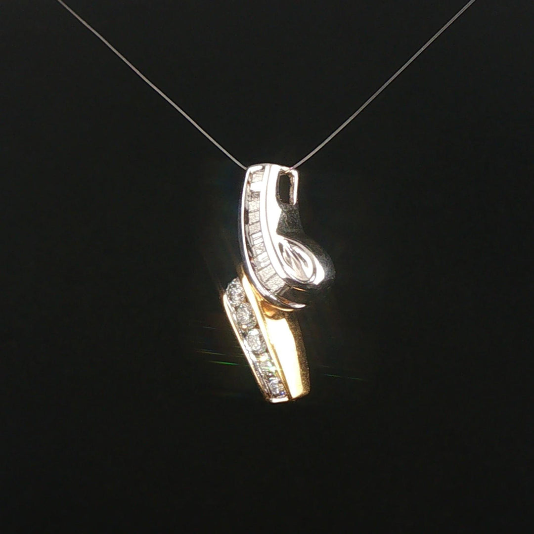 14k Yellow and White Gold 0.50cttw Round and Baguette Diamond Slide Pendant 1"
