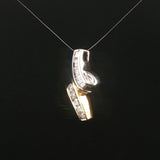 14k Yellow and White Gold 0.50cttw Round and Baguette Diamond Slide Pendant 1"