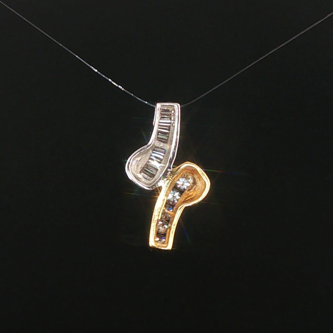 14k Yellow and White Gold 0.50cttw Round and Baguette Diamond Slide Pendant 1"