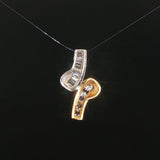 14k Yellow and White Gold 0.50cttw Round and Baguette Diamond Slide Pendant 1"