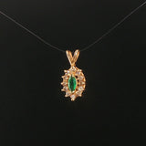 14k Yellow Gold Emerald and Diamond Halo Pendant