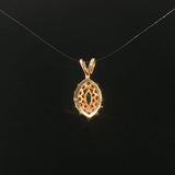 14k Yellow Gold Emerald and Diamond Halo Pendant
