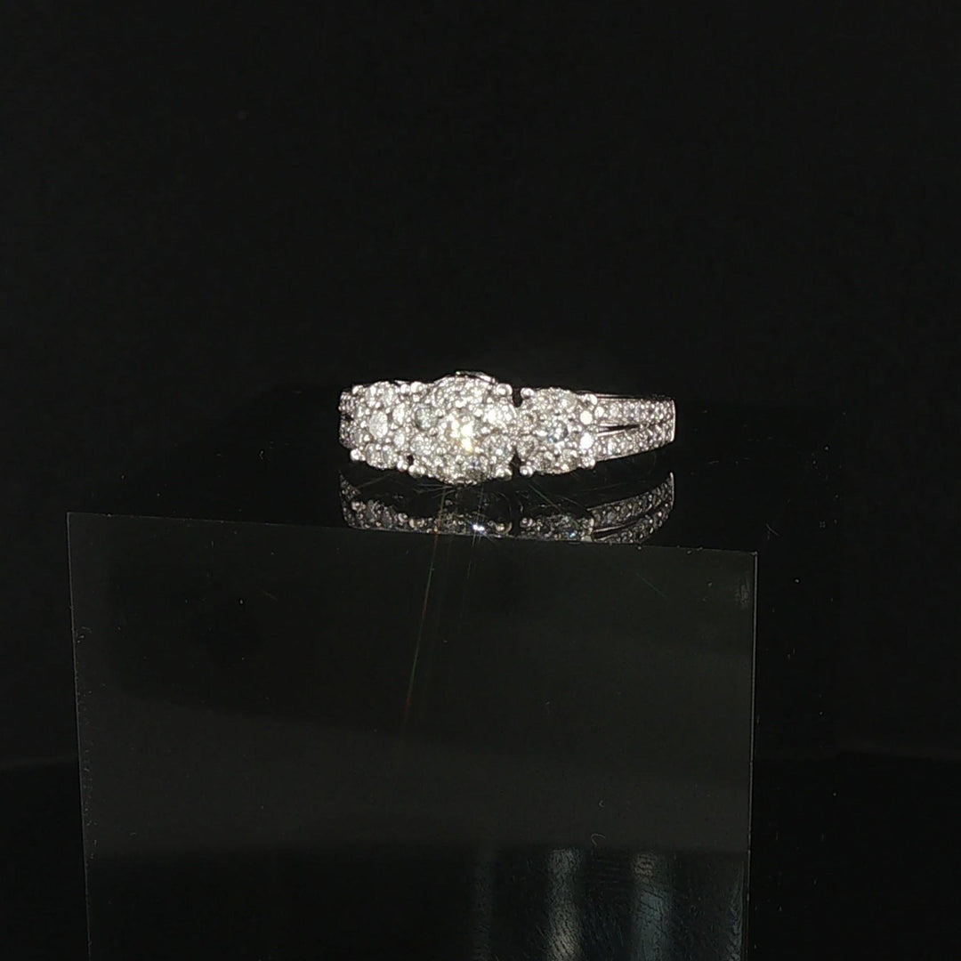 10k White Gold and 1cttw Diamond Three Diamond Halo Ring Size 7.75
