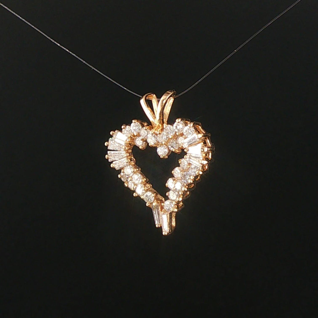 14k Yellow Gold and 0.60cttw Round and Baguette Diamond Heart Pendant