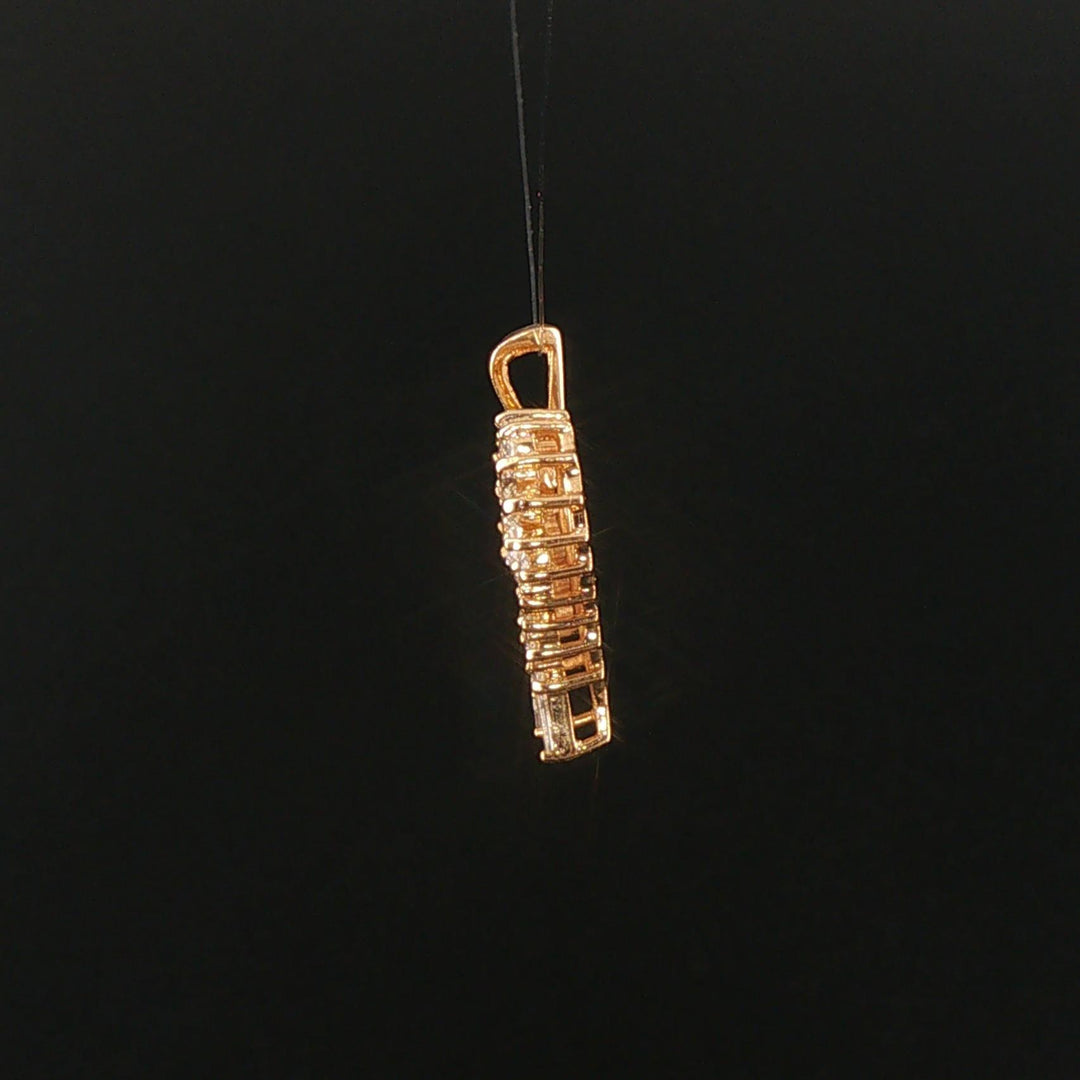 14k Yellow Gold and 0.60cttw Round and Baguette Diamond Heart Pendant