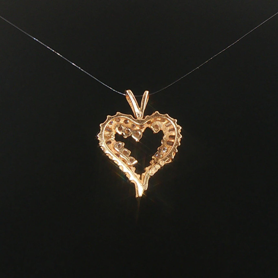 14k Yellow Gold and 0.60cttw Round and Baguette Diamond Heart Pendant